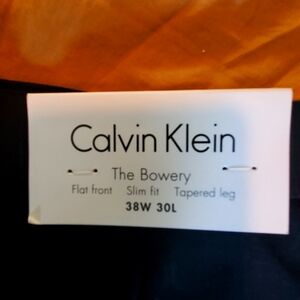 NWT Calvin Klein flat front, slim fit, tapered leg, The Bowery dark blue pants